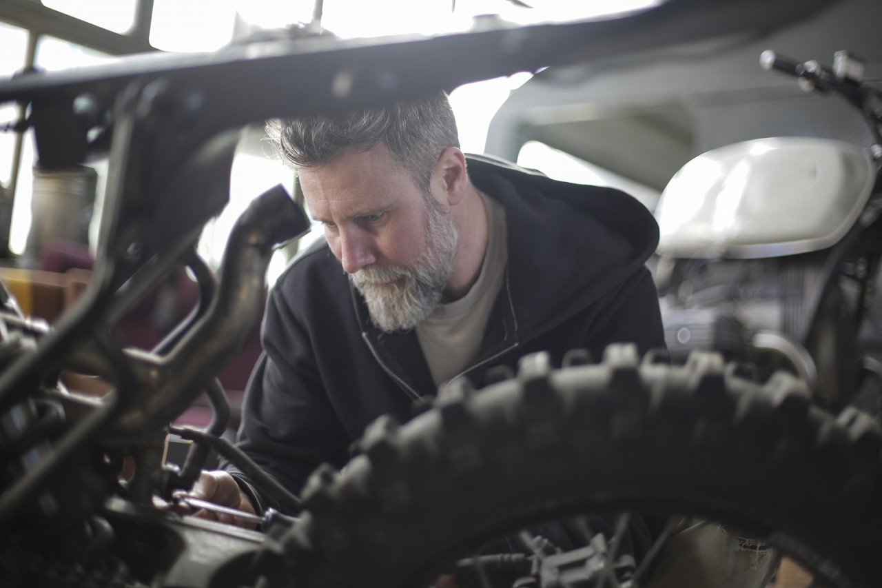 Working on a motorcycle sturgis buffalo chip